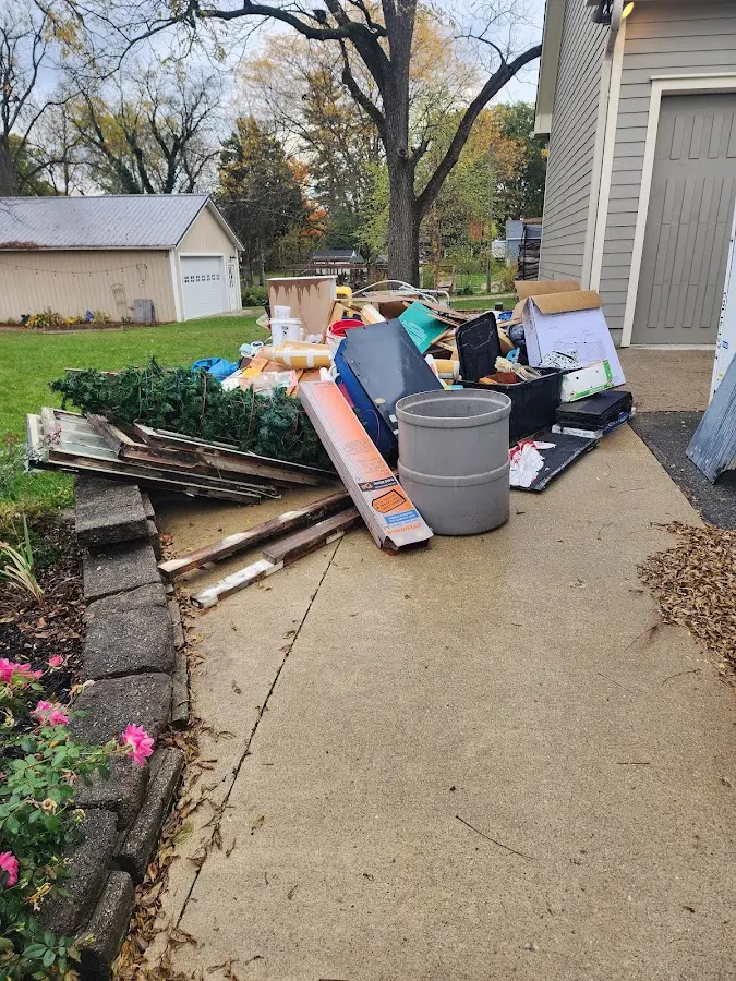 Dumpster being loaded with debris for Demolition Dumpster Rental in Prospect